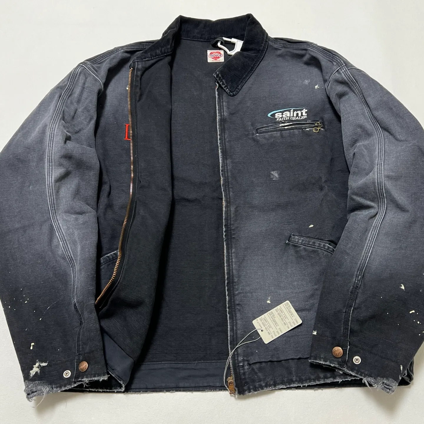 SAINT Mxxxxxx DETROIT JACKET/DRUG/BLK Detroit Workwear Washed and Distressed Jacket Washed Black S-XL A super heavy-duty Detroit jacket. It took more than 3 months to develop. All details. No detail. Complete reproduction and restoration. Customized washed and faded Assute canvas fabric. Rewashed the watermark to make the bones irregular and white. MX6 LOGO buttons, molded custom placket with LOGO zipper, no special shape zipper on chest
